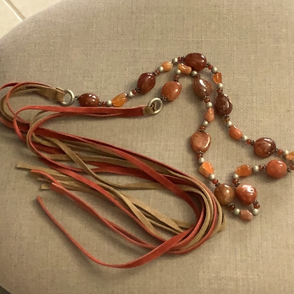 Fun self tie belt with stones and suede ties.